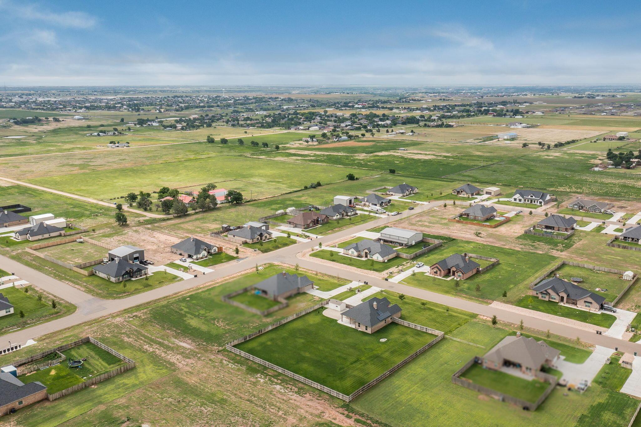 9734 Cicada Trail Amarillo, TX 79119 - Photo 32 of 34 an aerial view of residential houses with outdoor space