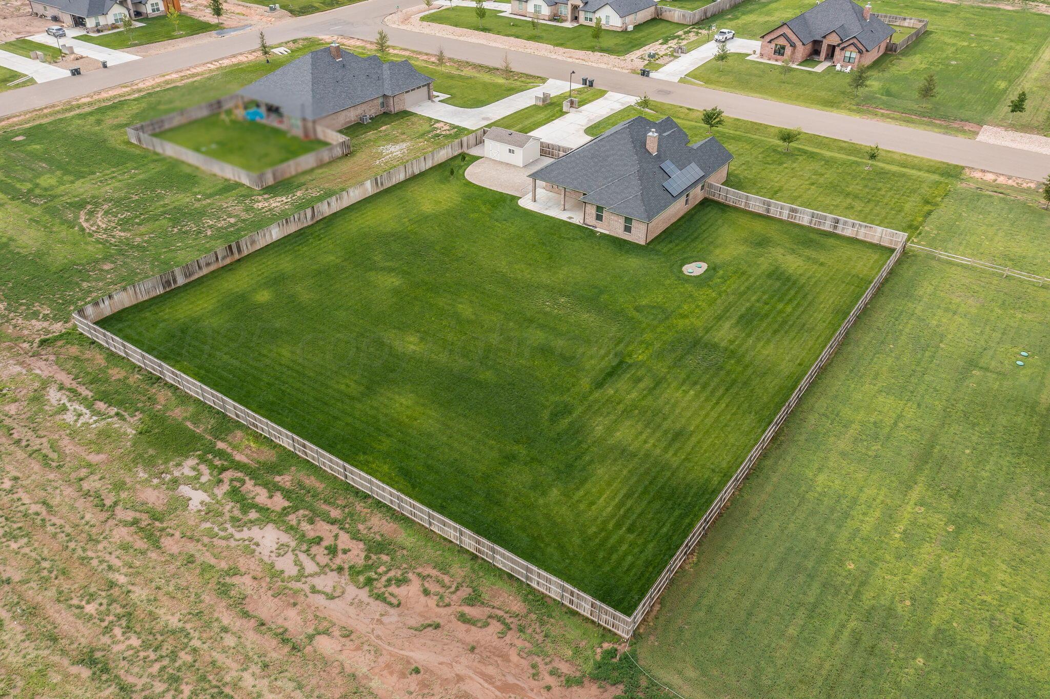 9734 Cicada Trail Amarillo, TX 79119 - Photo 4 of 34 a view of a backyard