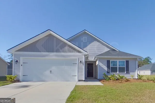 front view of a house with table and chairs