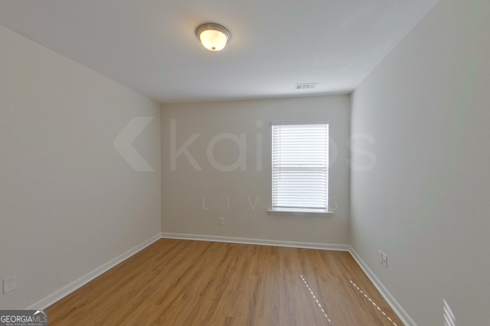 106 Ebenezer Blf Way Springfield, GA 31329 - Photo 11 of 19 an empty room with a window
