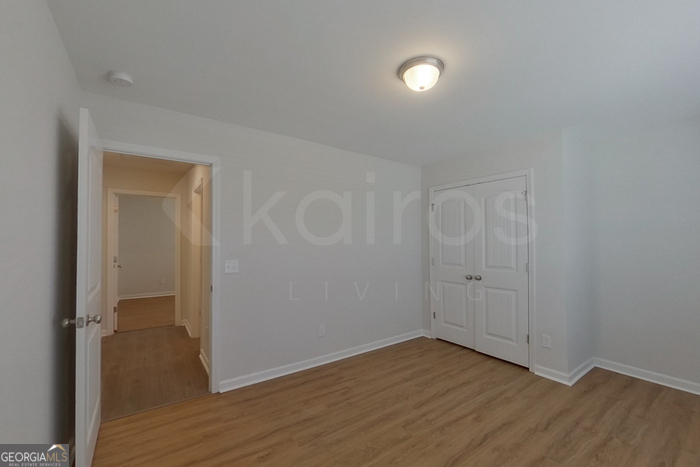 106 Ebenezer Blf Way Springfield, GA 31329 - Photo 6 of 19 wooden floor in an empty room