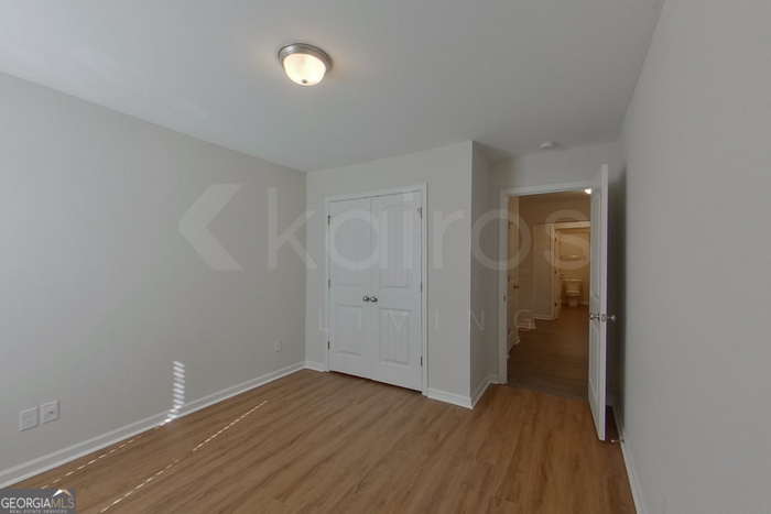 106 Ebenezer Blf Way Springfield, GA 31329 - Photo 10 of 19 a view of a room with wooden floor