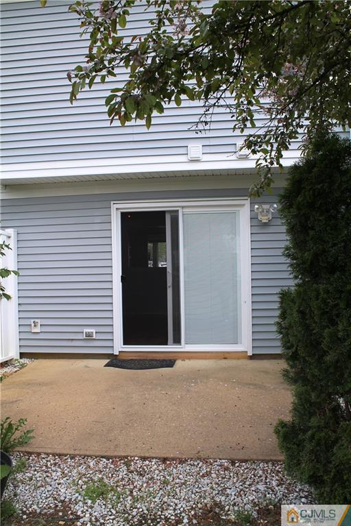 59 La Rue Lane, Unit 59 East Brunswick, NJ 08816 - Photo 17 of 17 a front view of a house