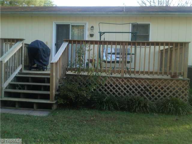 104 Hickory Tree Road Mocksville, NC 27028 - Photo 7 of 13 Patio/Deck. Back deck.... Lots of privacy in back yard.