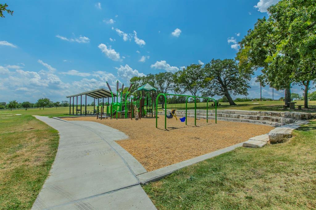 1936 Post Oak Drive Waco, TX 76705 - Photo 31 of 33 View of property's community featuring a lawn