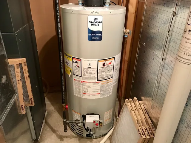 a view of house with backyard