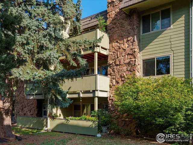 a view of an empty room with a balcony