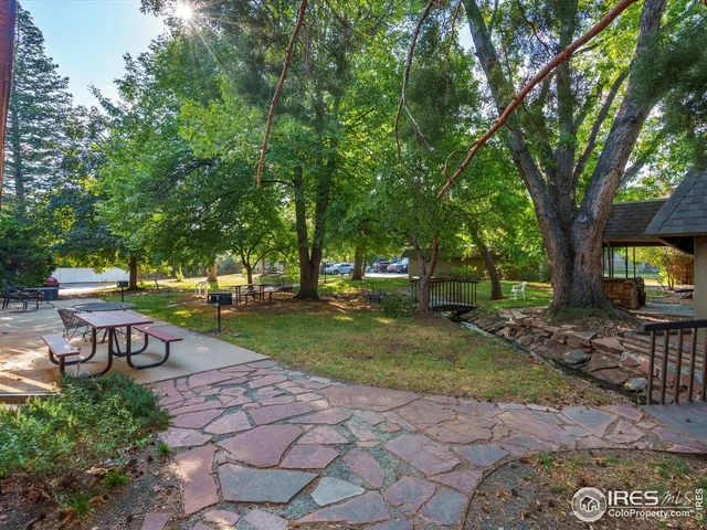 a view of a swimming pool with a porch