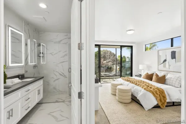 a bathroom with double sink and a mirror