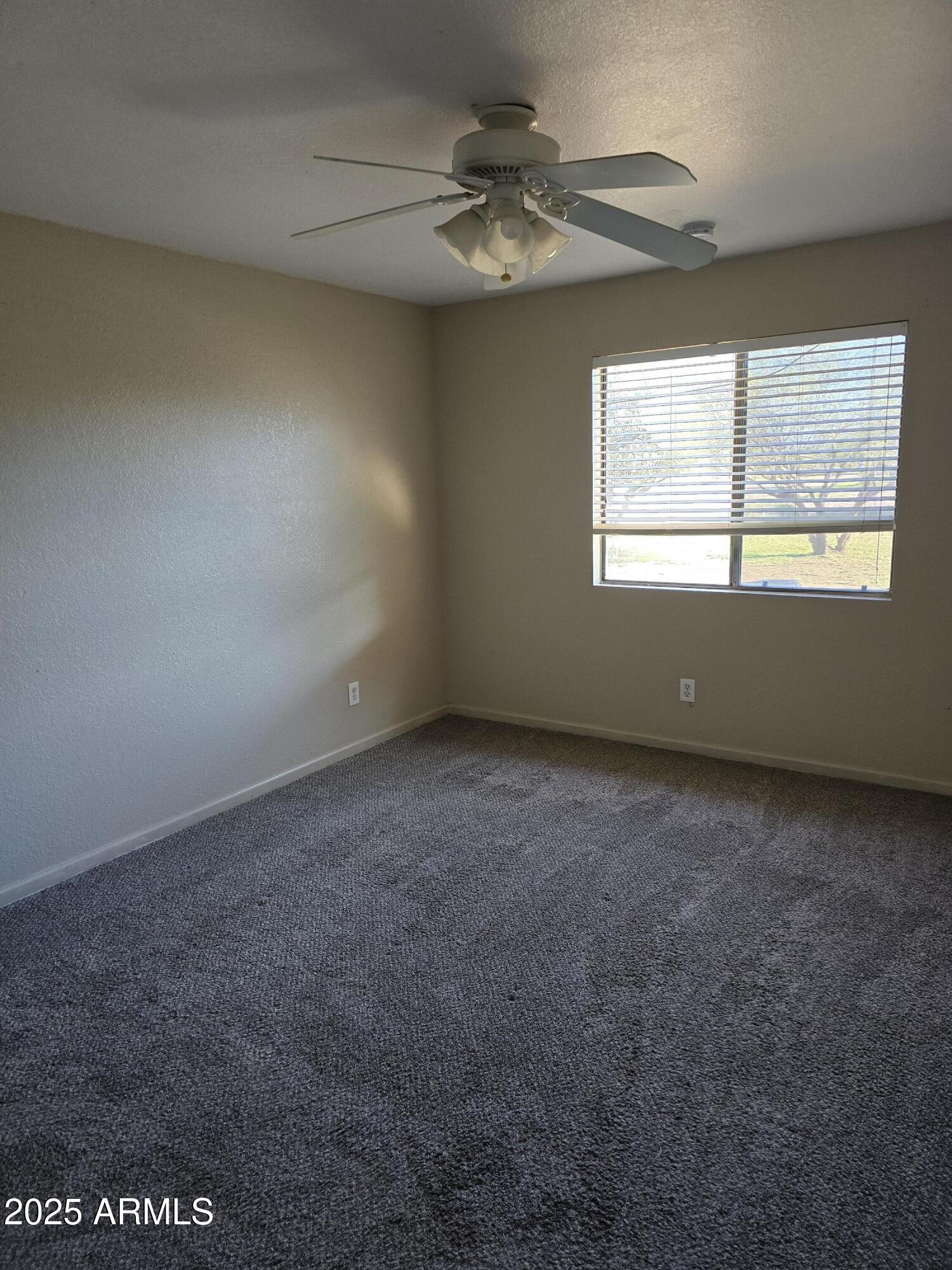 240 East Oak Street Huachuca City, AZ 85616 - Photo 16 of 43 an empty room with a window