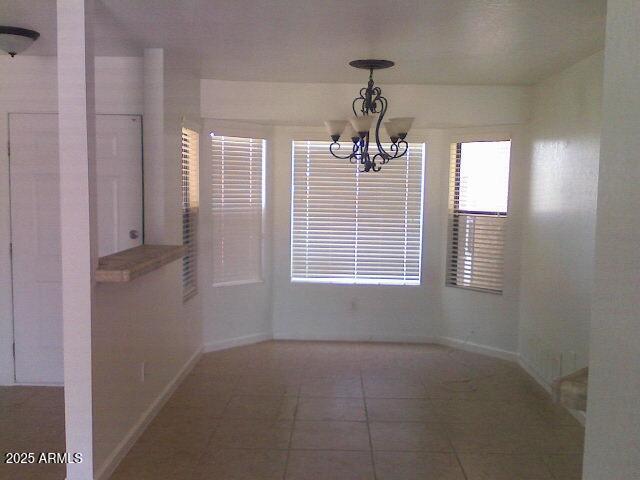 240 East Oak Street Huachuca City, AZ 85616 - Photo 21 of 43 a view of an empty room with a window
