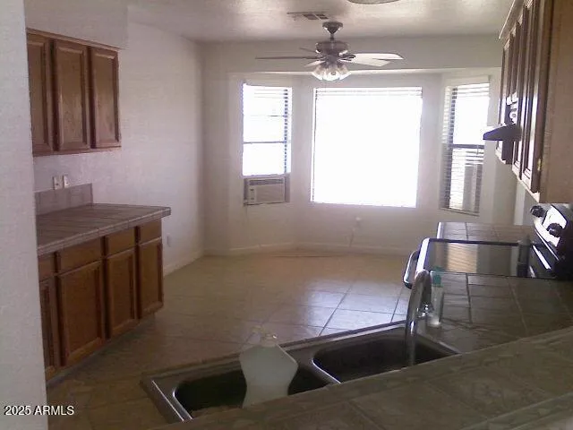 a view of a room with windows