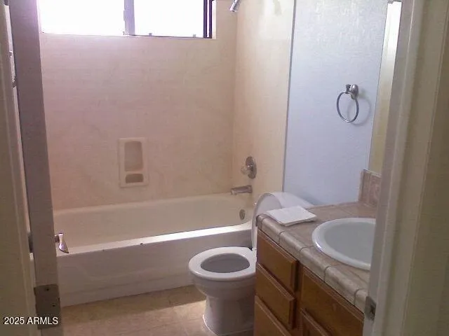 a bathroom with a sink toilet and bathtub