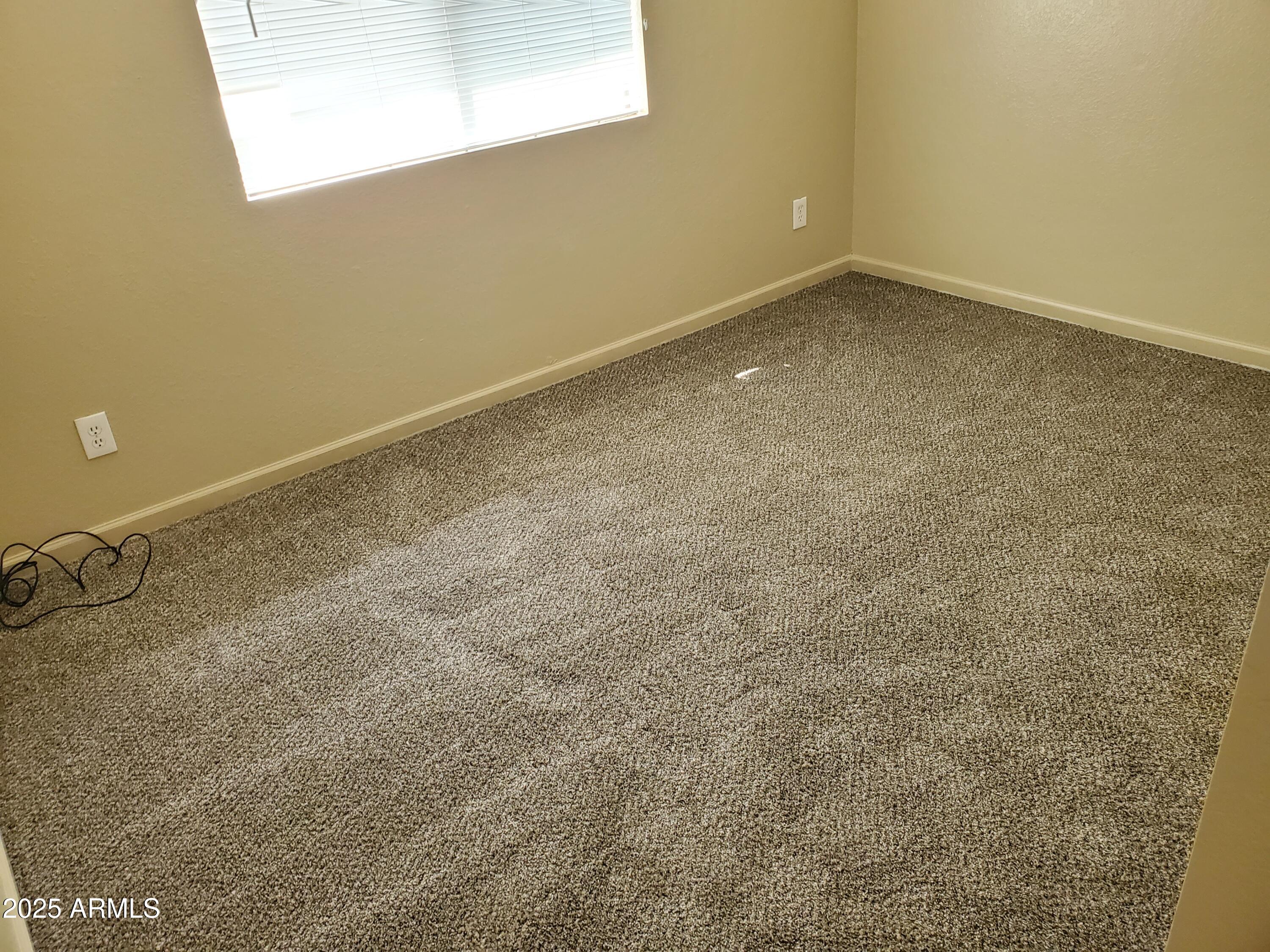 240 East Oak Street Huachuca City, AZ 85616 - Photo 35 of 43 an empty room with a window