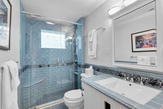 a view of a bedroom with a large window