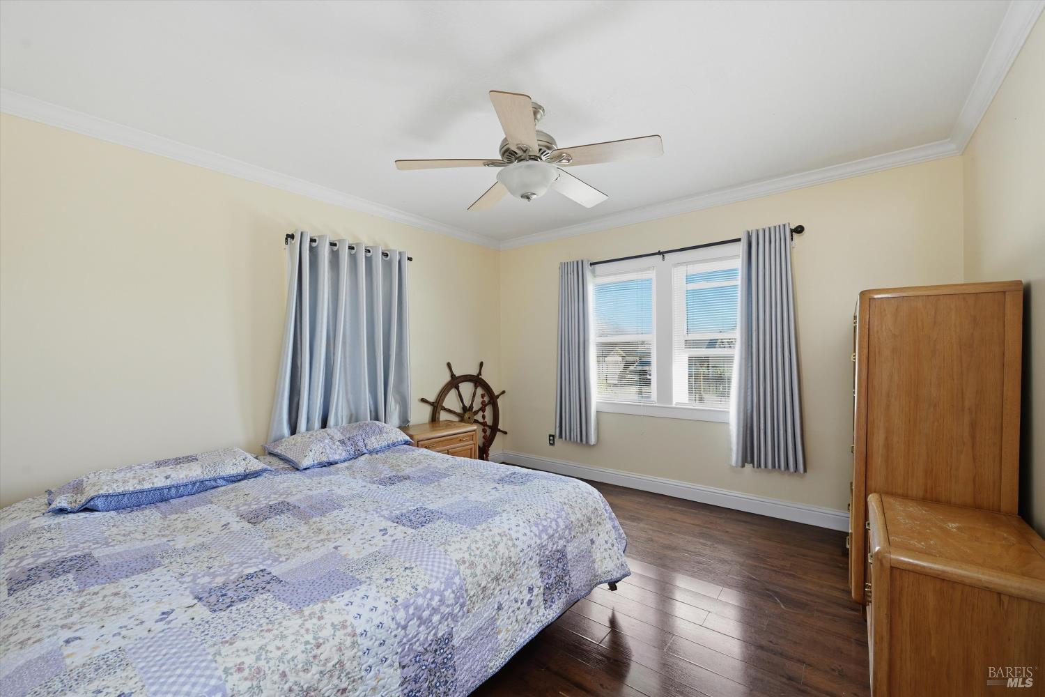 3440 Beach Street Nice, CA 95464 - Photo 13 of 27 a bedroom with a bed and a window