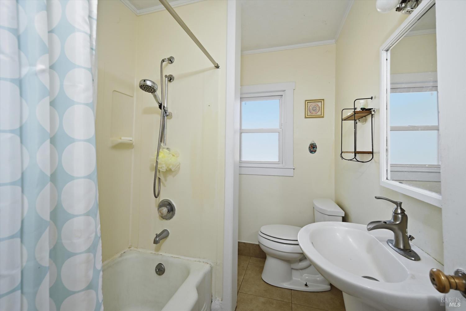 3440 Beach Street Nice, CA 95464 - Photo 15 of 27 a bathroom with a sink a toilet and shower