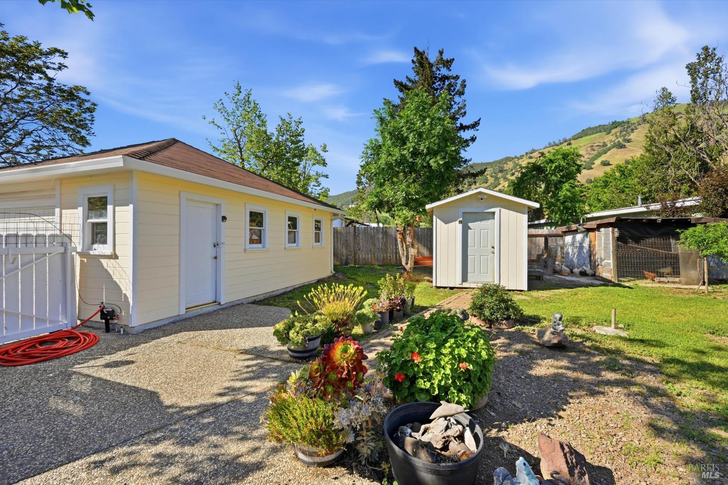 3440 Beach Street Nice, CA 95464 - Photo 27 of 27 a front view of a house with a yard