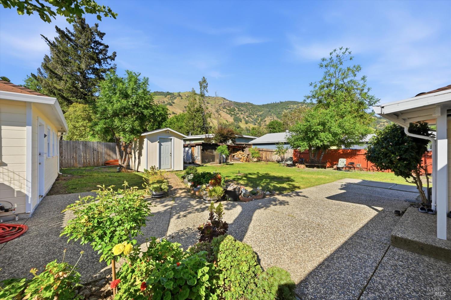 3440 Beach Street Nice, CA 95464 - Photo 3 of 27 a front view of a house with a yard
