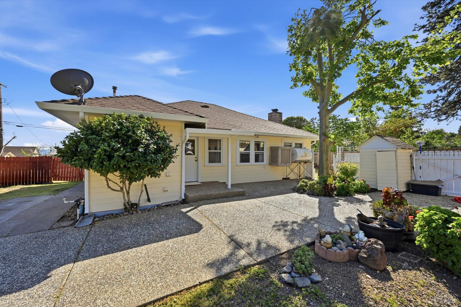 3440 Beach Street Nice, CA 95464 - Photo 4 of 27 a front view of a house with garden