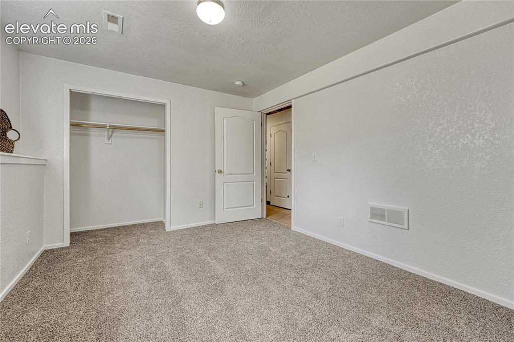 7285 Julynn Road Colorado Springs, CO 80919 - Photo 34 of 45 a view of an empty room