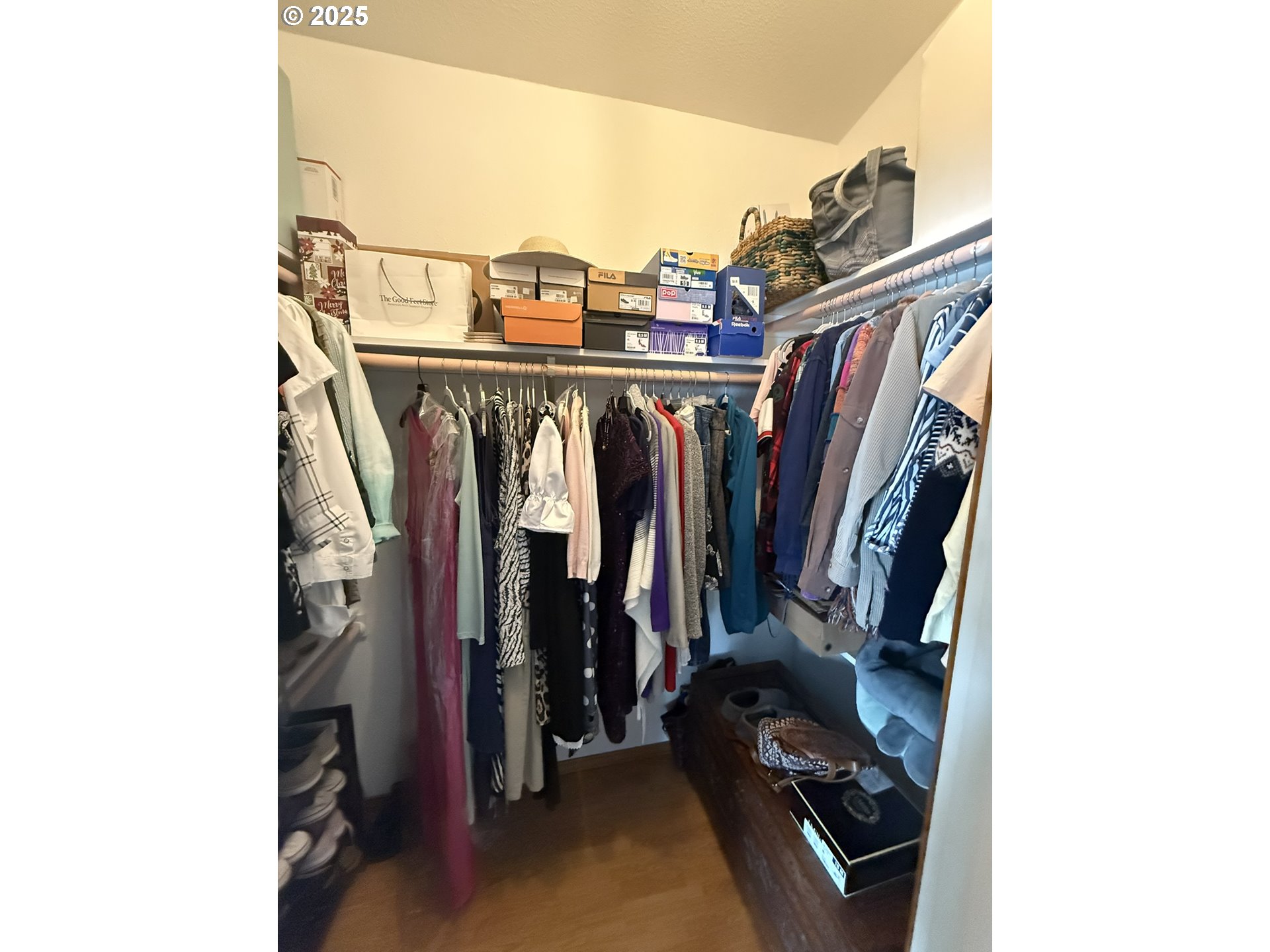 100 River Bend Road, Unit 17 Reedsport, OR 97467 - Photo 24 of 29 a view of walk in closet with clothes and shoes