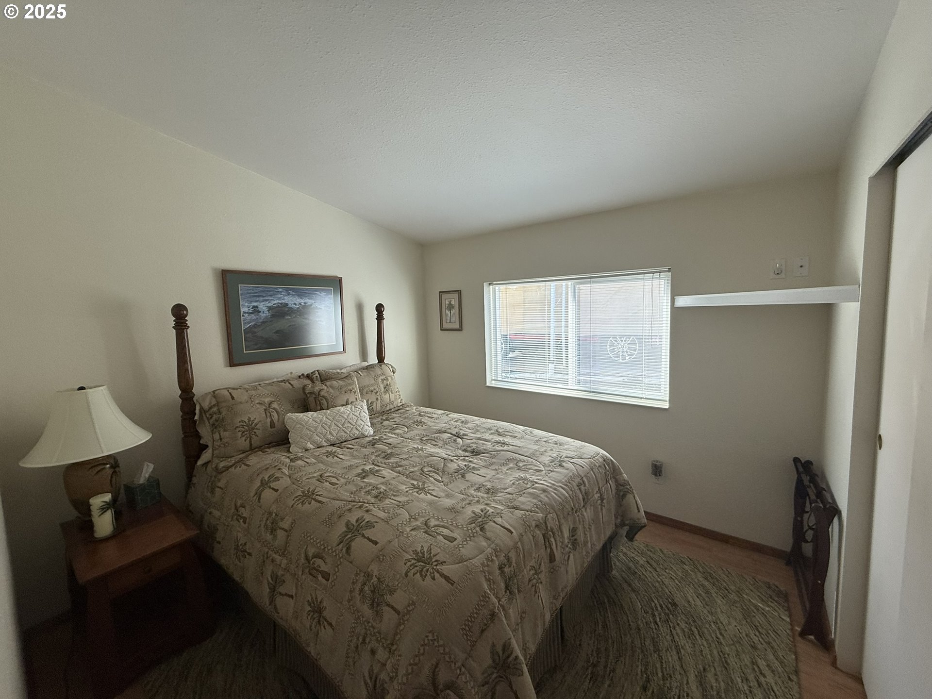 100 River Bend Road, Unit 17 Reedsport, OR 97467 - Photo 29 of 29 a bedroom with a bed and a window