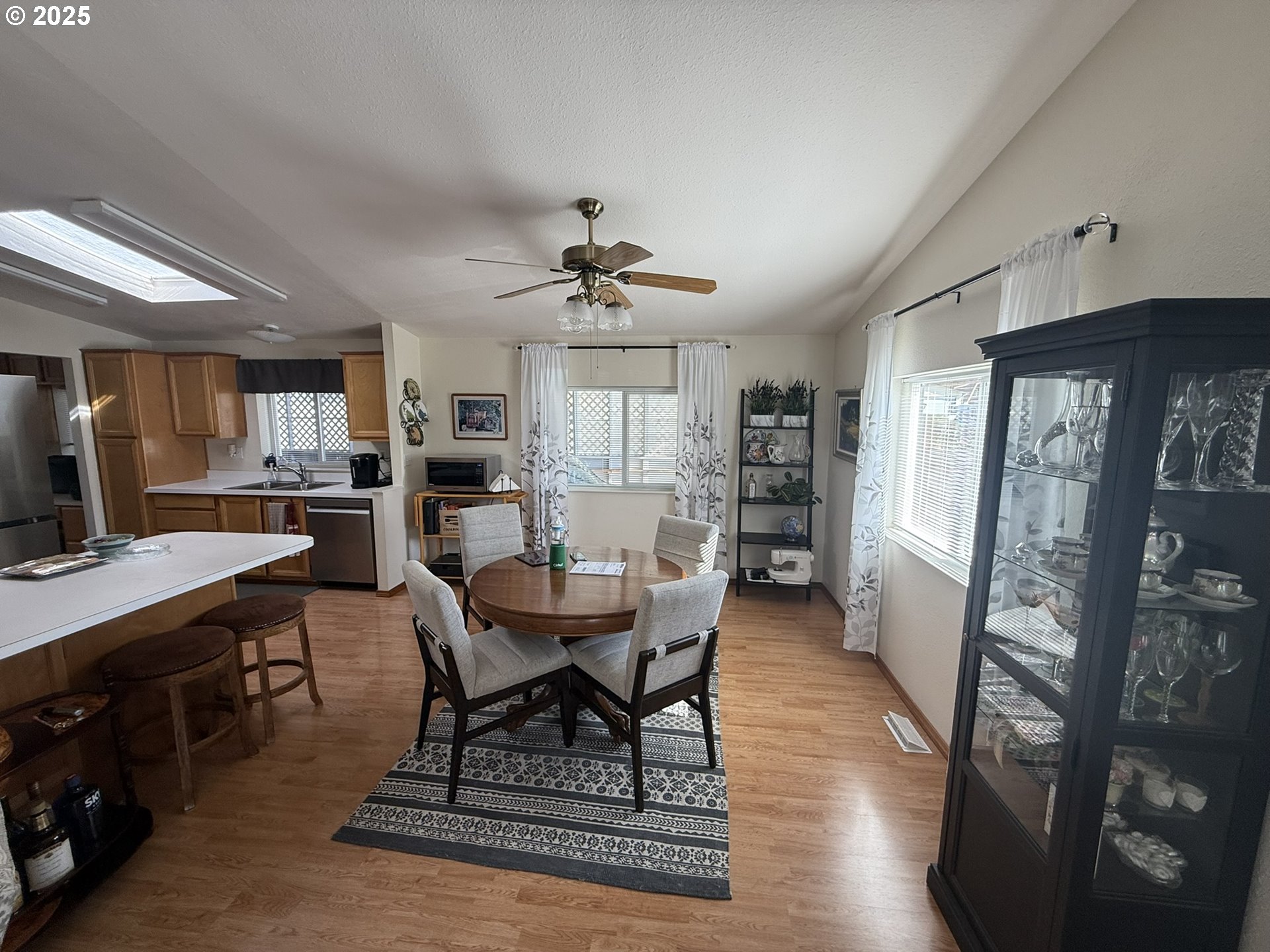 100 River Bend Road, Unit 17 Reedsport, OR 97467 - Photo 7 of 29 a dining room with furniture and window