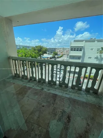 a view of a terrace with a yard