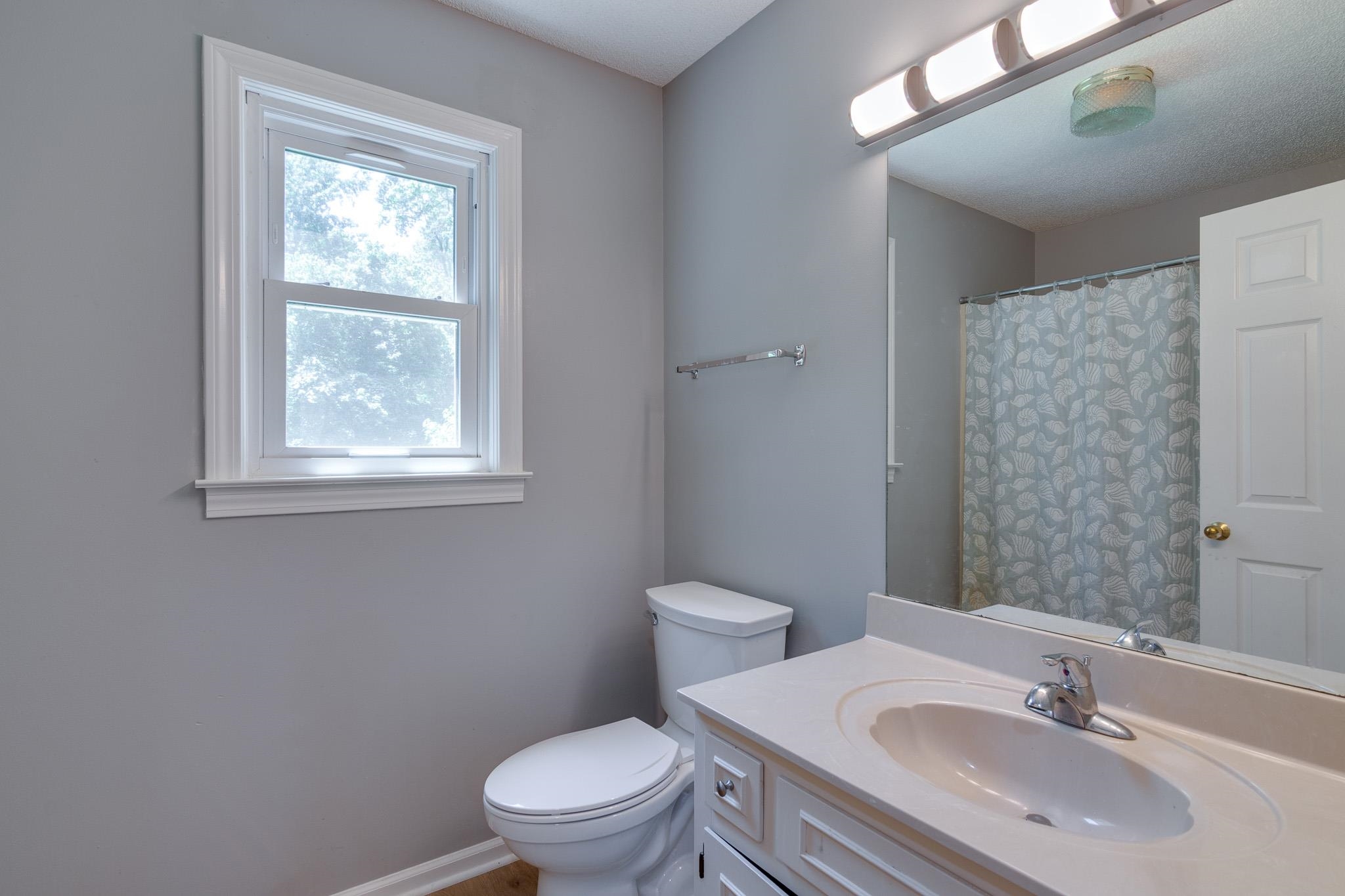 462 Woodbridge Road Somerville, TN 38068 - Photo 19 of 30 Full bath featuring vanity and a shower with curtain