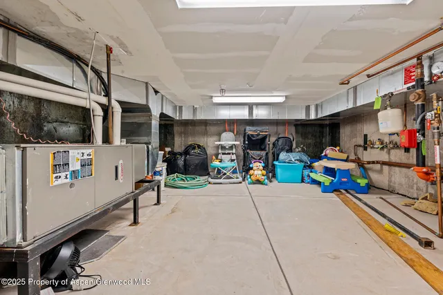 a view of staircase with wooden floor and a window