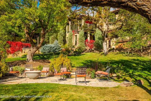 a view of swimming pool with outdoor seating
