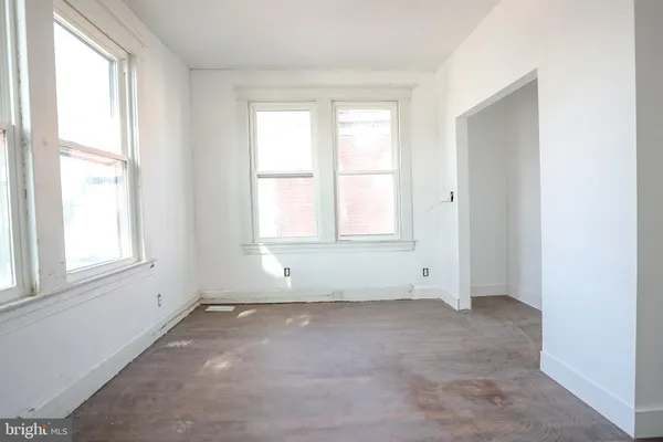 an empty room with windows