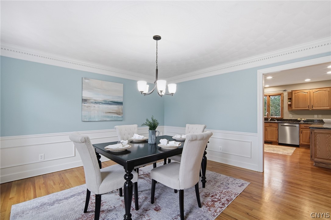 4084 Cortina Road Lysander, NY 13027 - Photo 20 of 48 Large formal diningroom with dental and shadowbox