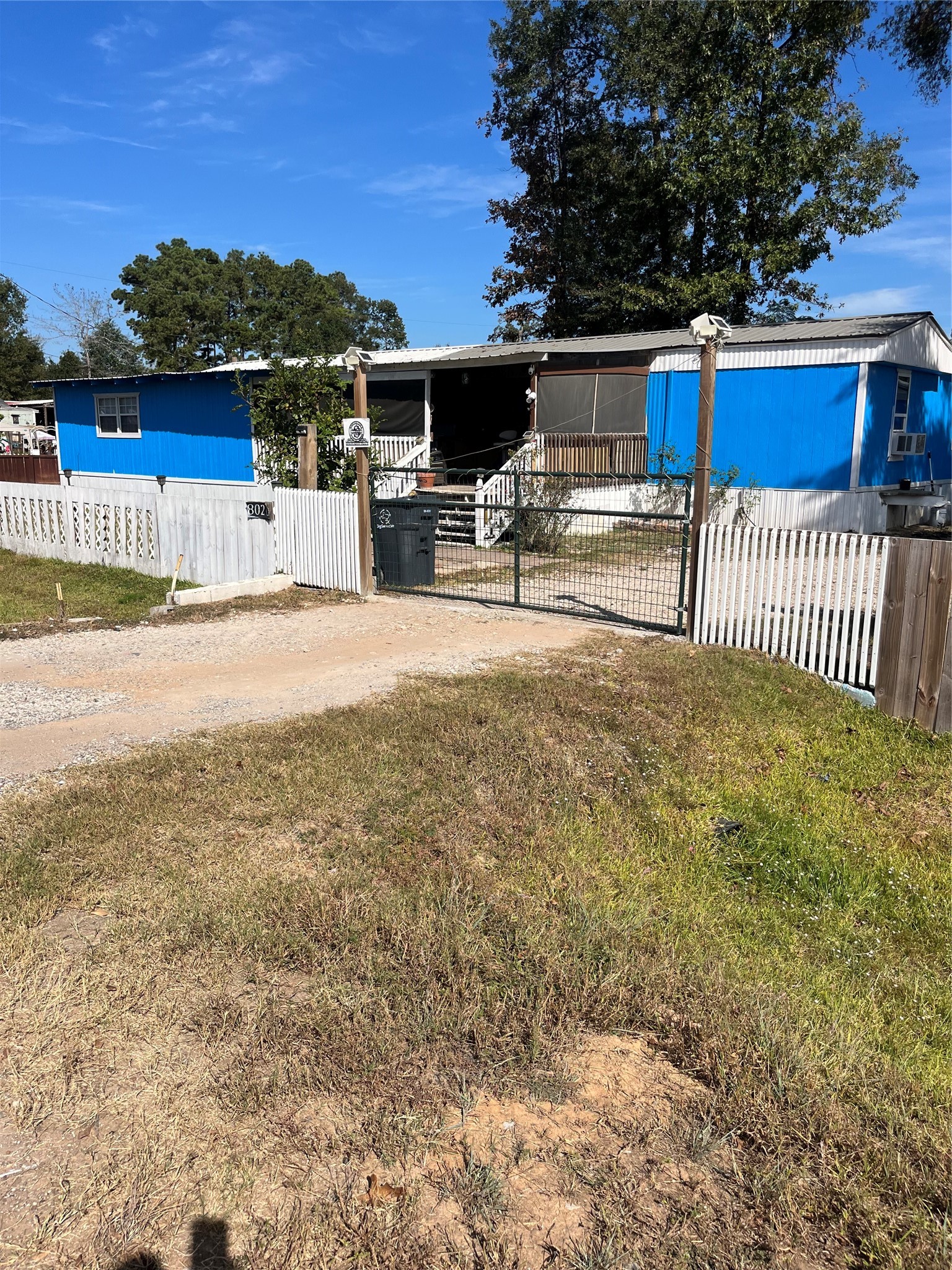 8026 Forest Trace Conroe, TX 77306 - Photo 1 of 28 a view of a house with backyard and porch
