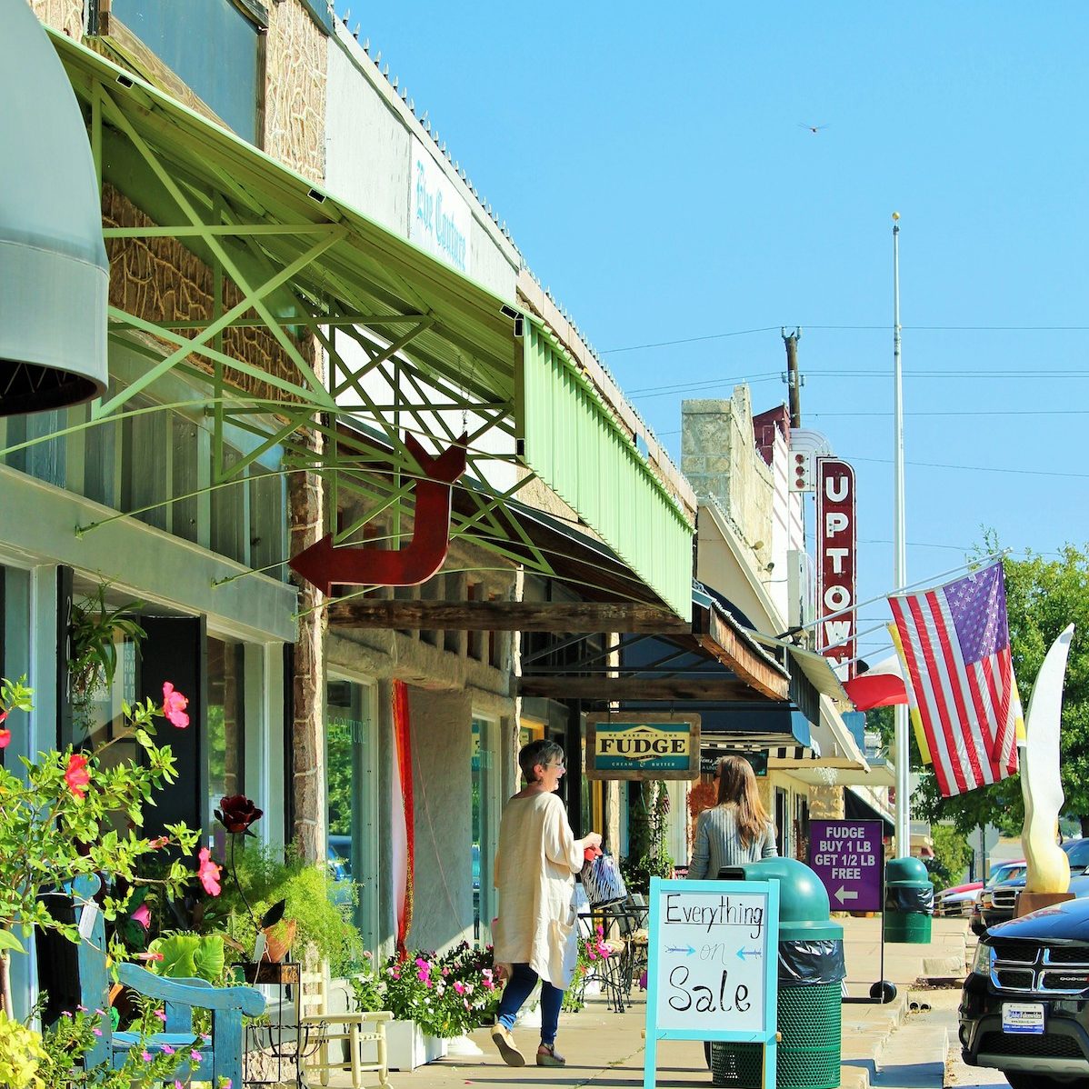1611 Johnson Street Marble Falls, TX 78654 - Photo 38 of 40 a view of people sitting in front of retail shops
