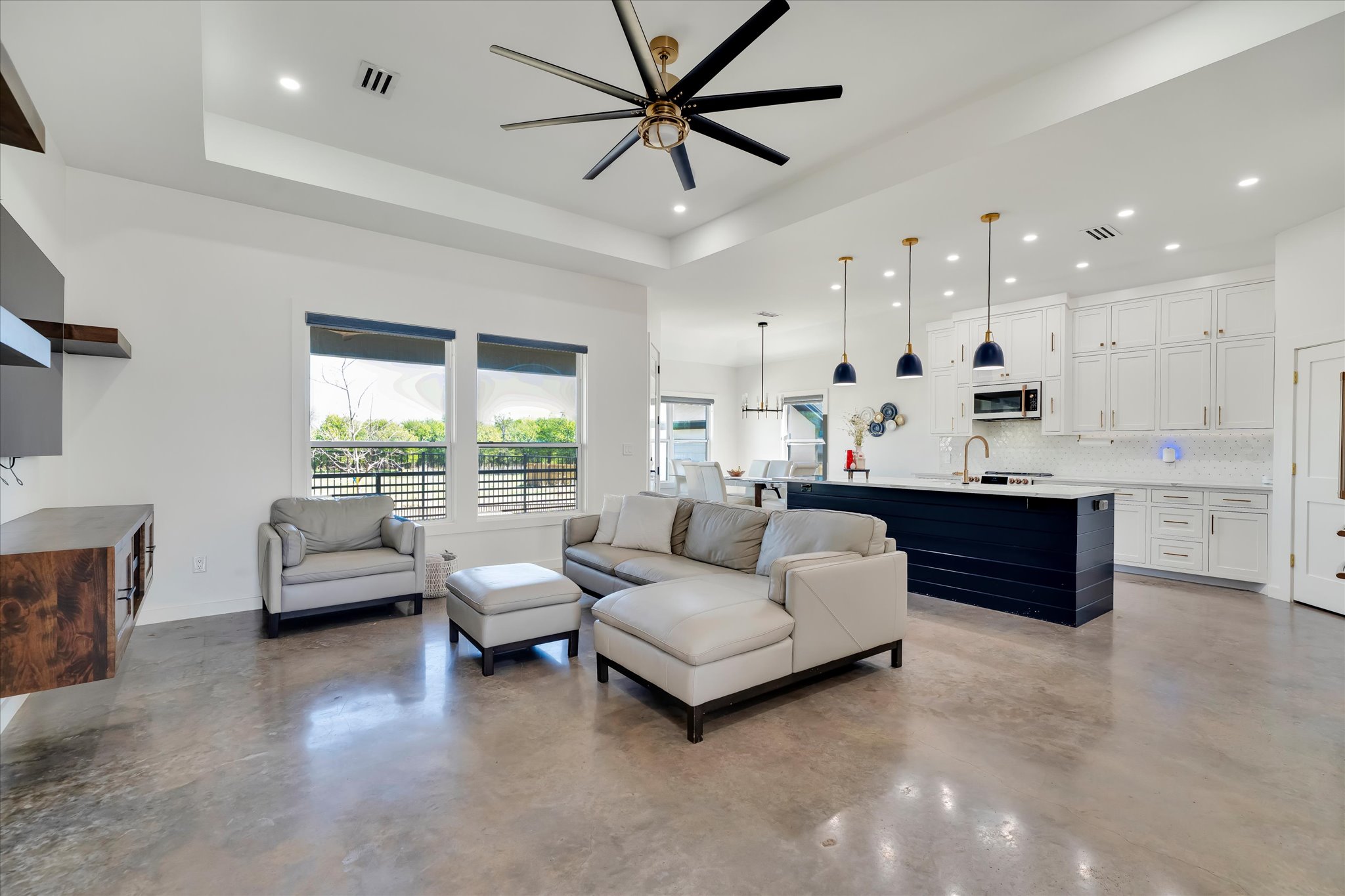 1611 Johnson Street Marble Falls, TX 78654 - Photo 5 of 40 a living room with furniture and a large window