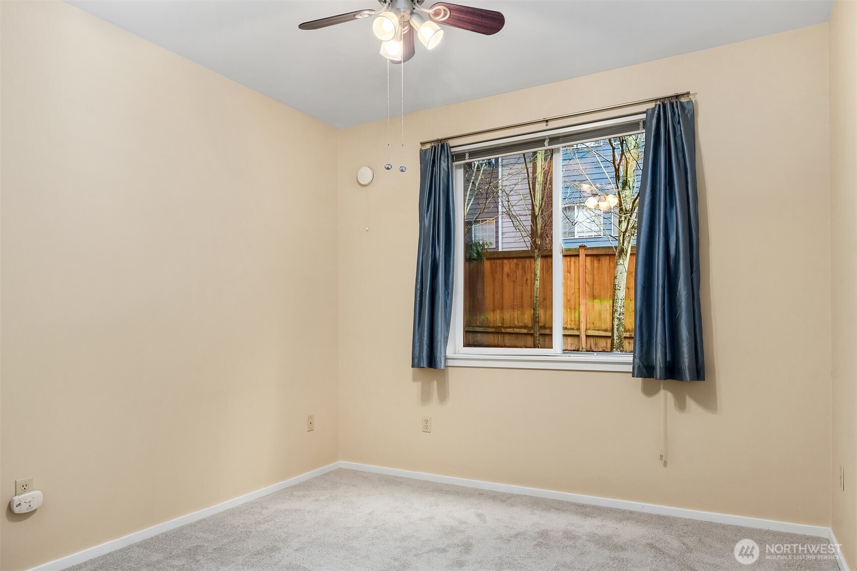 4325 Northeast 5th Court, Unit C101 Renton, WA 98059 - Photo 12 of 17 an empty room with a window