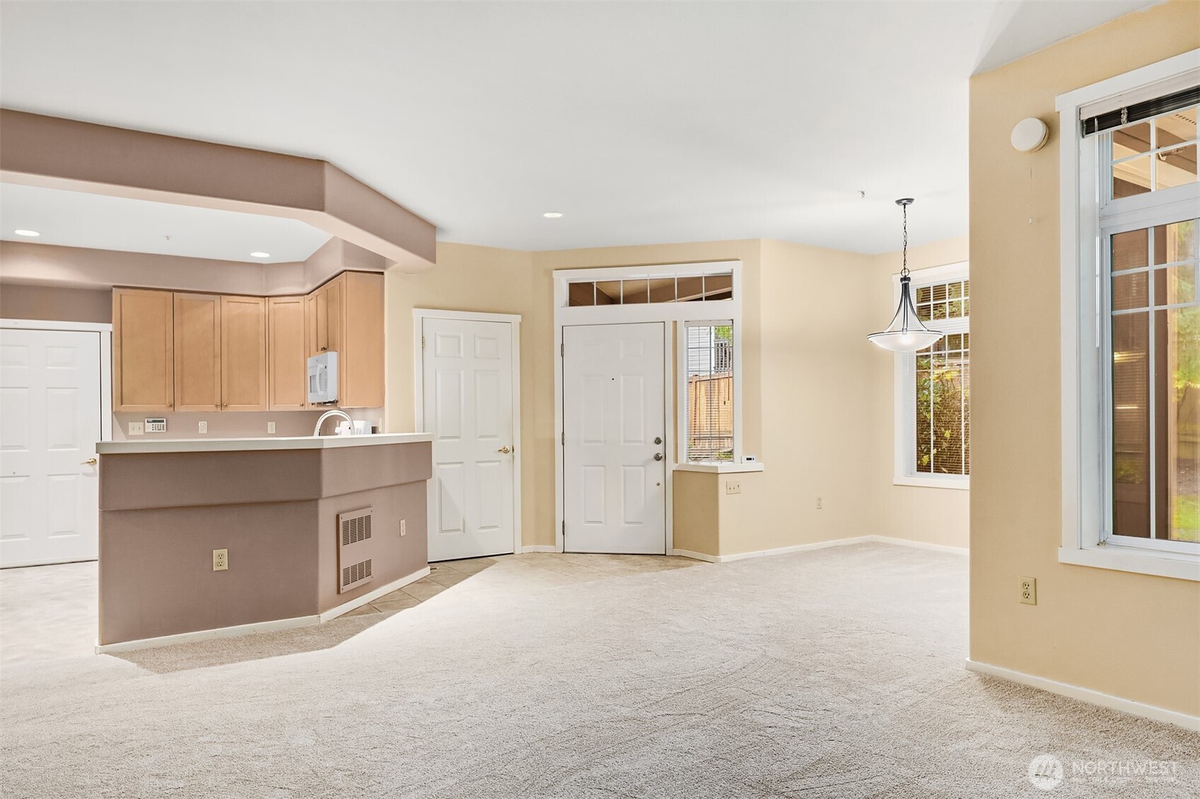4325 Northeast 5th Court, Unit C101 Renton, WA 98059 - Photo 5 of 17 a view of an empty room and window