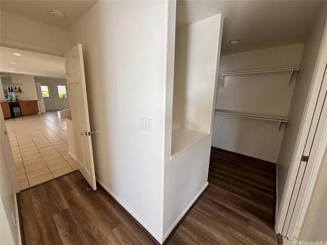 a view of a hallway view with staircase