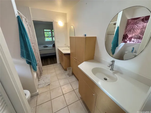 a bathroom with a sink and mirror