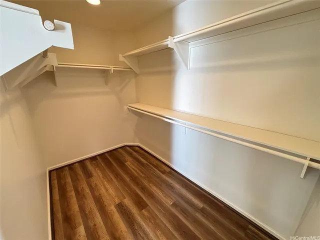 a view of a room with an empty walk in closet