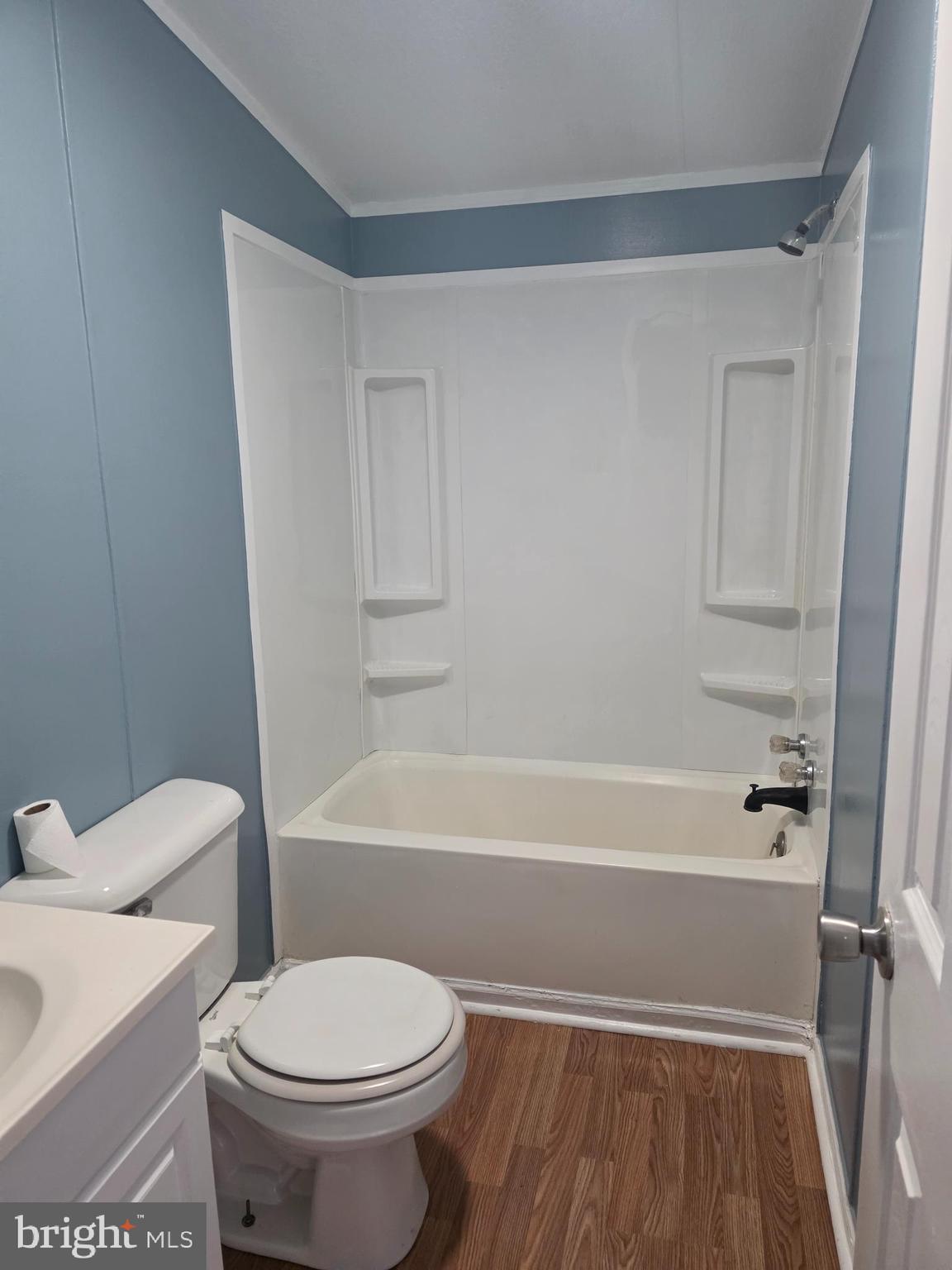 2732 Crossroad School Road Hedgesville, WV 25427 - Photo 33 of 41 a bathroom with a toilet and a bathtub