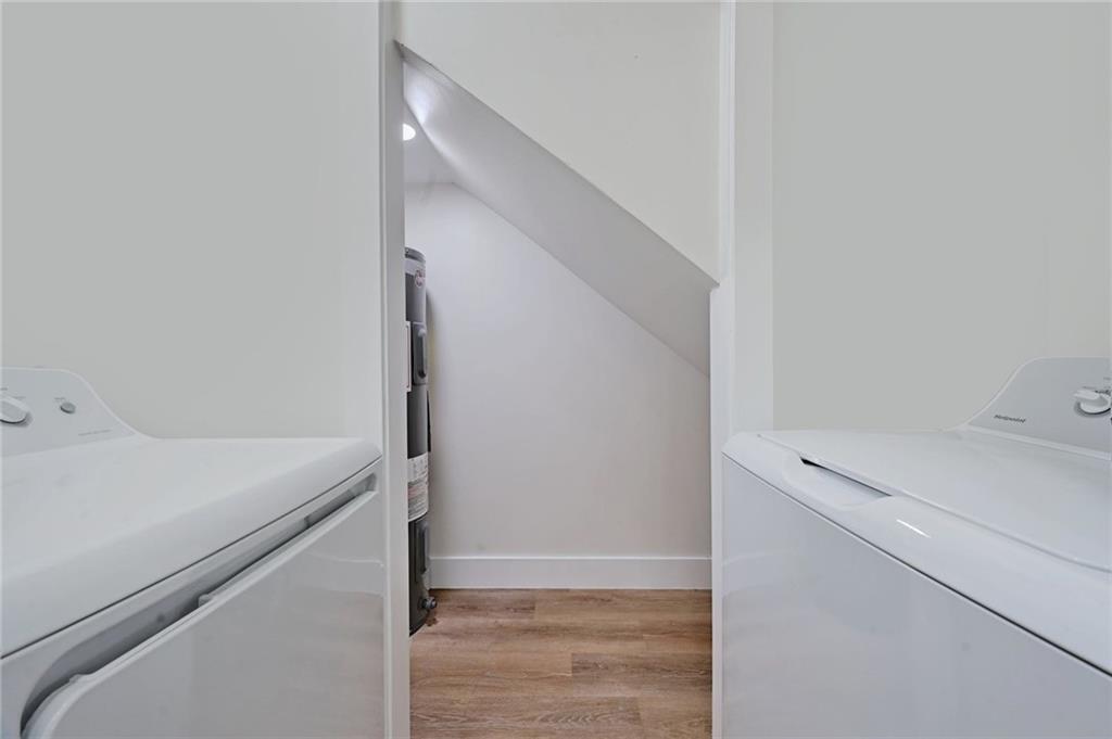 3511 Alpine Circle, Unit 1 Austin, TX 78704 - Photo 12 of 22 a utility room with dryer and washer