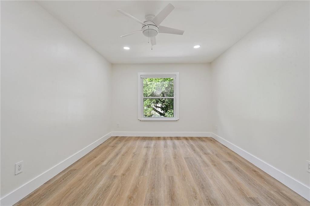3511 Alpine Circle, Unit 1 Austin, TX 78704 - Photo 15 of 22 a view of room with window and hardwood floor