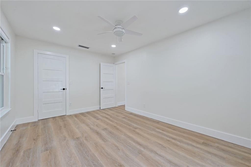 3511 Alpine Circle, Unit 1 Austin, TX 78704 - Photo 16 of 22 wooden floor in an empty room
