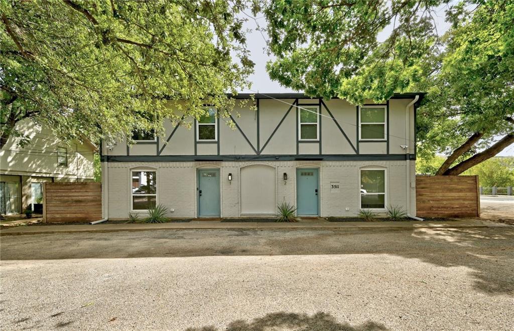 3511 Alpine Circle, Unit 1 Austin, TX 78704 - Photo 2 of 22 a front view of a house with a yard