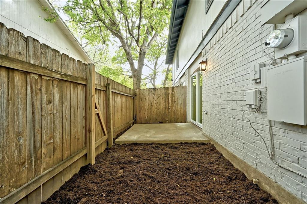 3511 Alpine Circle, Unit 1 Austin, TX 78704 - Photo 22 of 22 a view of a pathway along with wooden fence