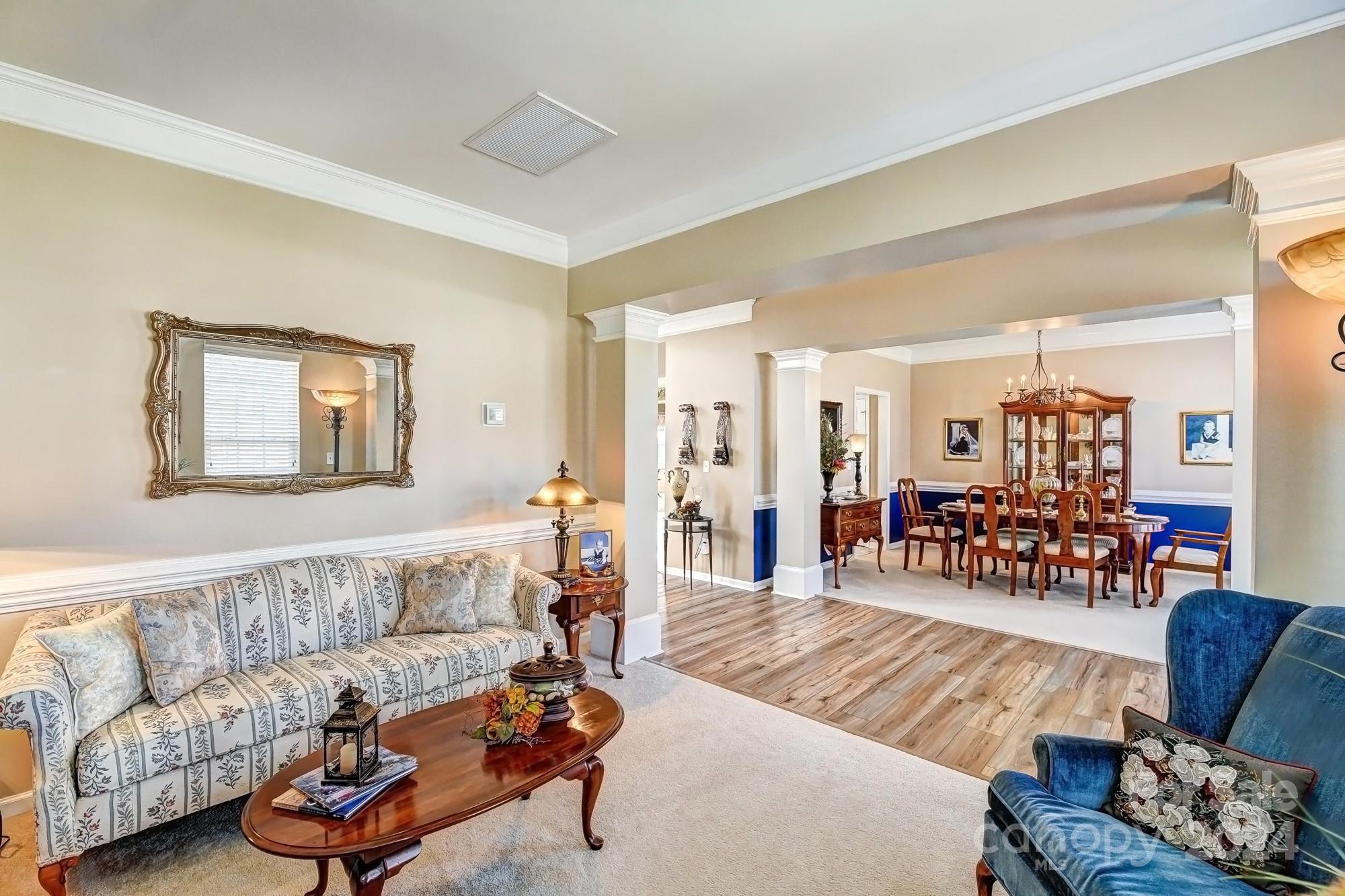 182 Harris Farm Road Mooresville, NC 28115 - Photo 20 of 46 a living room with furniture and wooden floor