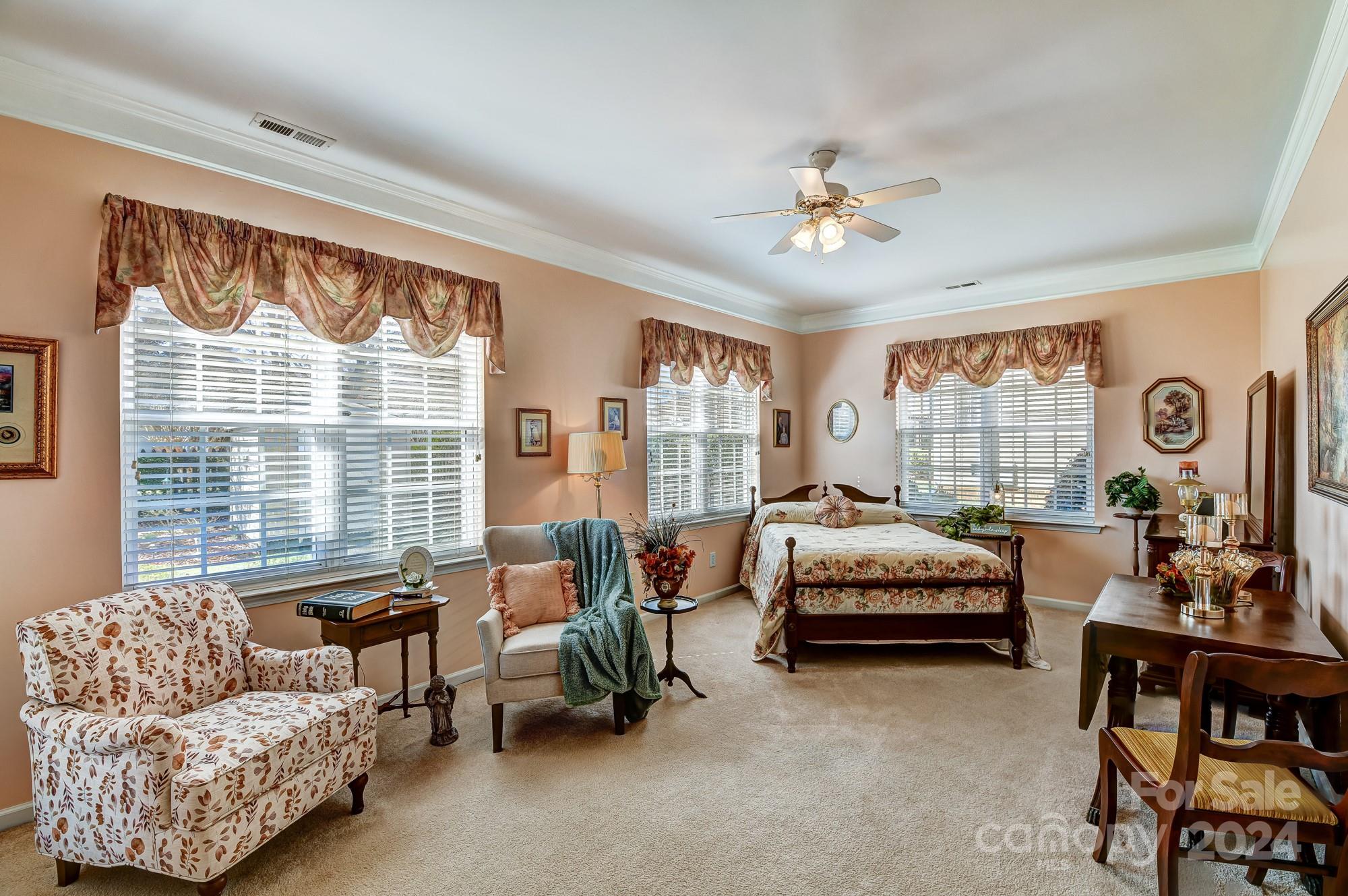 182 Harris Farm Road Mooresville, NC 28115 - Photo 21 of 46 a living room with furniture and a large window